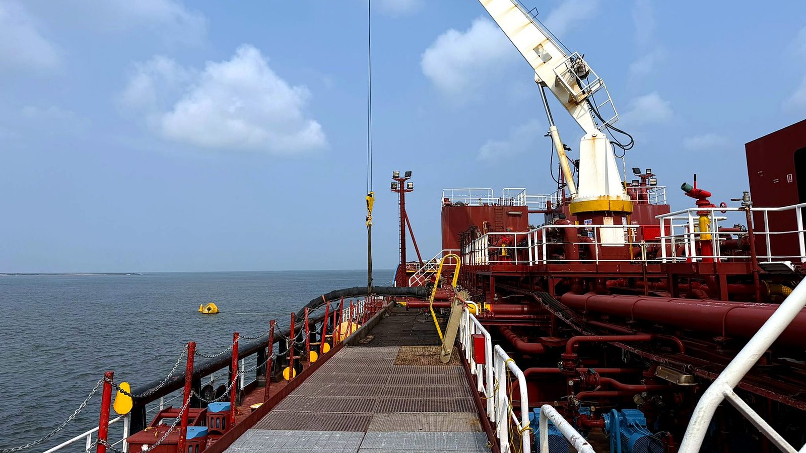 Tanker deck and crane at sea Tanker deck and crane at sea
